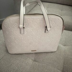 Elegant Cream Designer Handbag